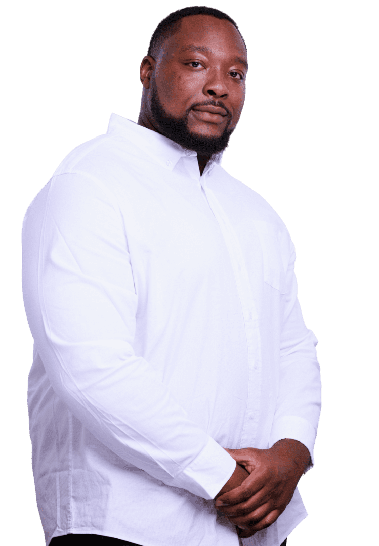 Atlanta BIPOC Mental Health Advocate - 30080, 30339, 30067, 30213, 30097 Black male mental health professional in Atlanta, Georgia, with a beard, wearing white shirt smiling warmly, specializing in depression and anxiety treatment.