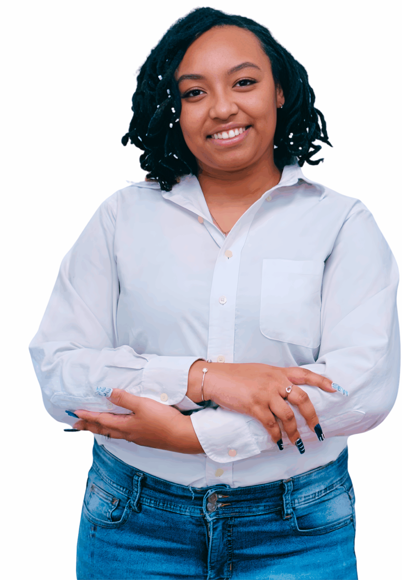 Anxiety Therapy, Identity Support & Trauma Counseling | Georgia 30080, 30339, 30067, 30213 Smiling Black female therapist wearing a light blue button-down shirt and jeans, standing with arms crossed, representing anxiety therapy, identity exploration, and trauma therapy in Georgia (30080, 30339, 30067, 30213).