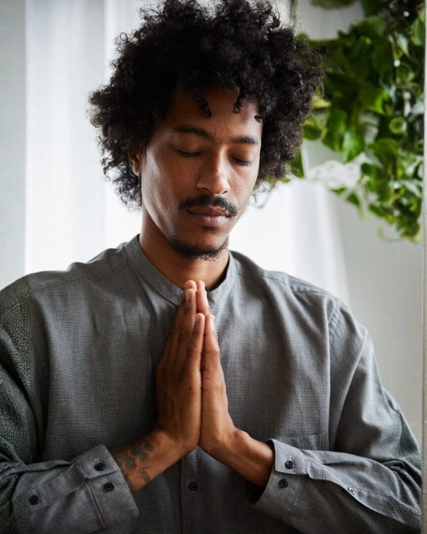 Person practicing grounding and reflection, representing coping vs healing through trauma therapy and anxiety treatment in Atlanta.